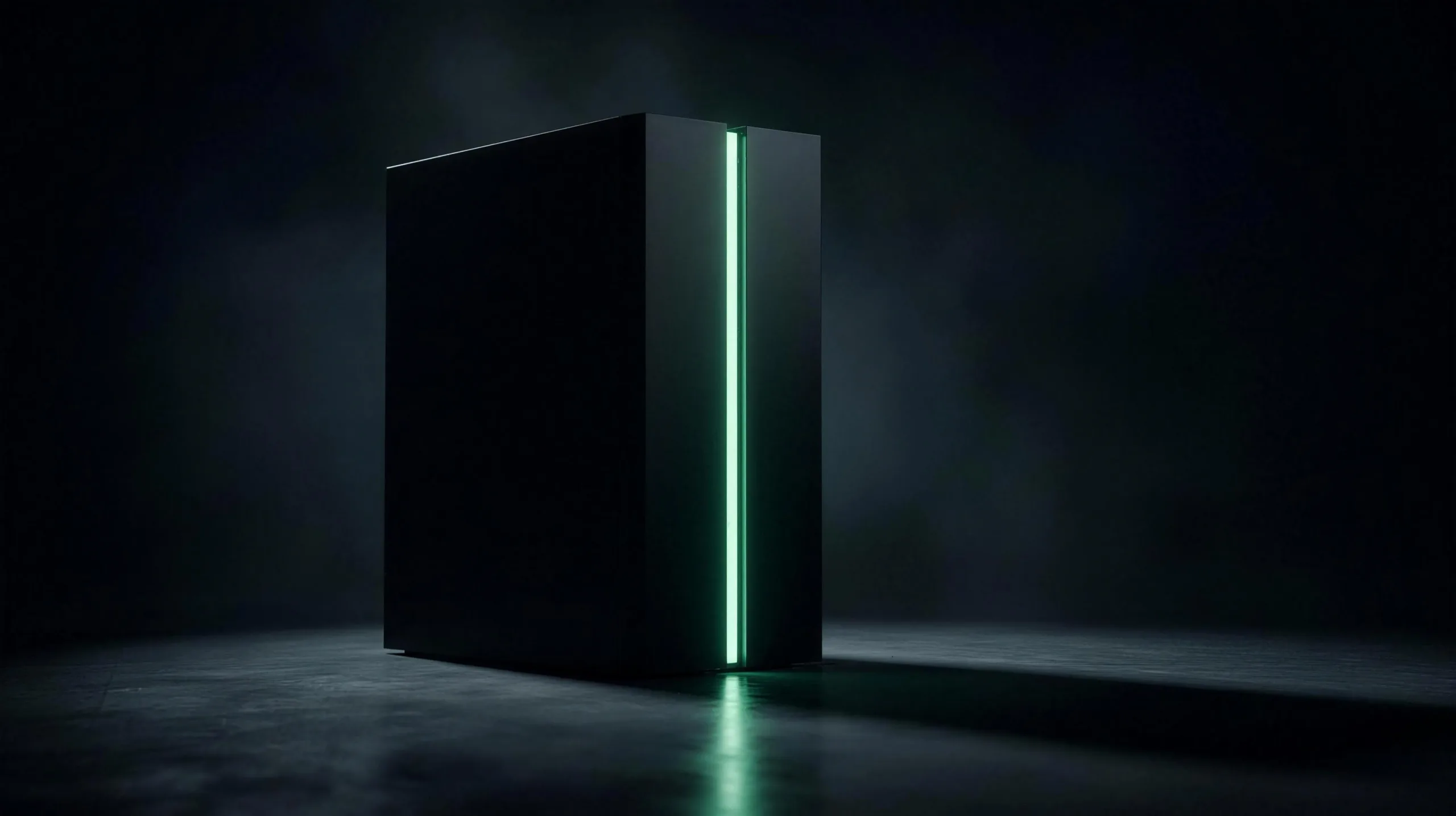 A matte-black private AI server tower with a single vertical mint light seam, standing in a dark concrete room